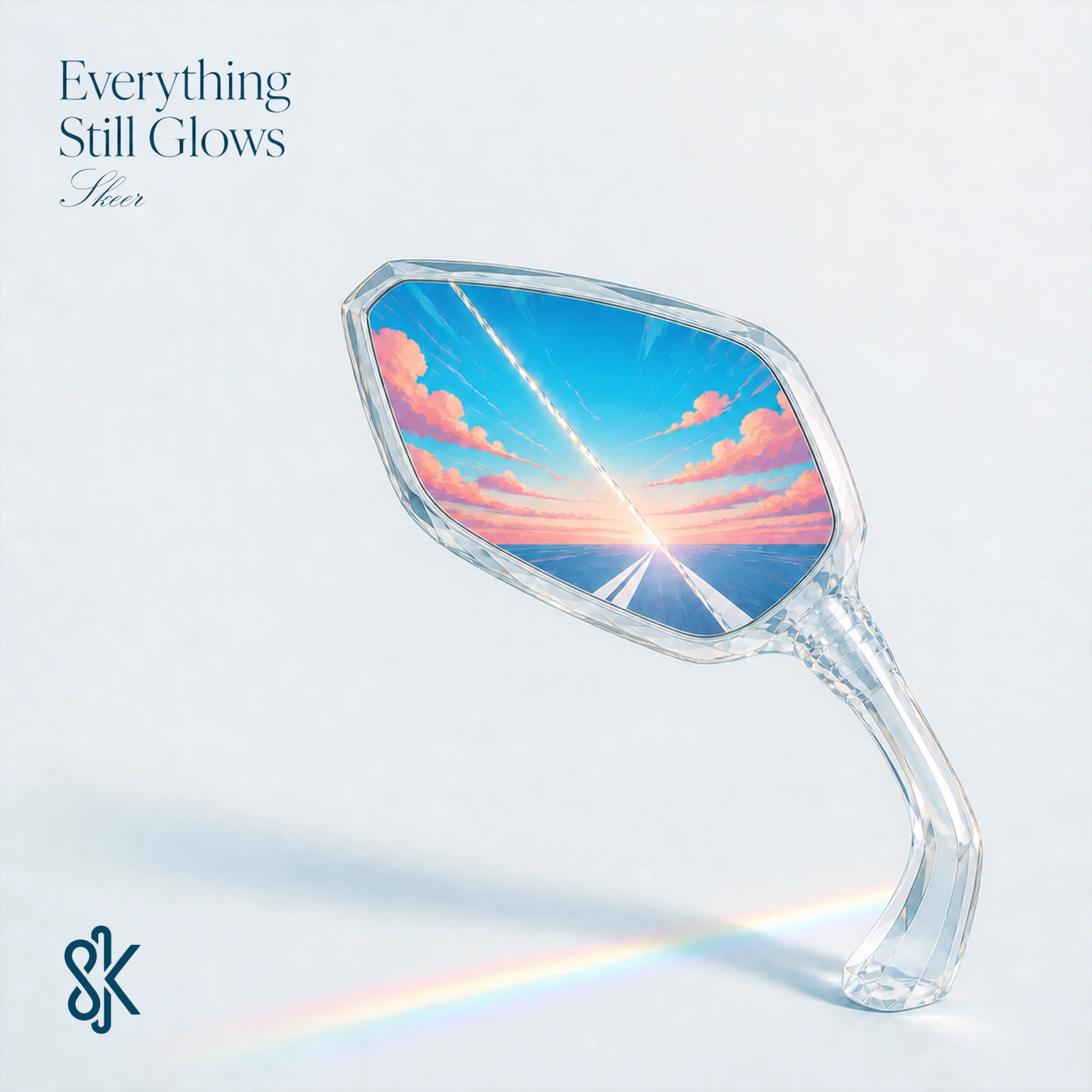 Everything Still Glows release artwork, a glass mirror framing a colourful sky